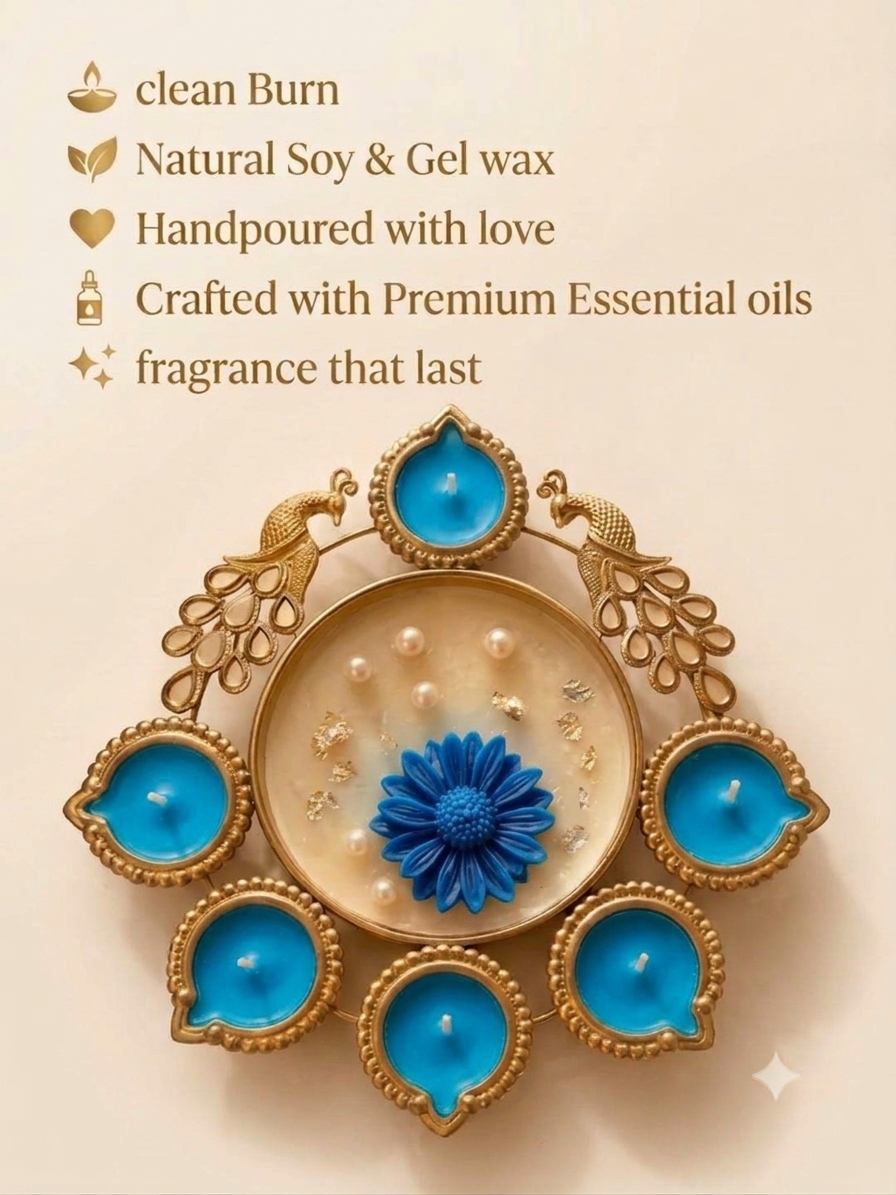 Gold peacock metal diya platter with sky blue wax candles and central pearl flower dish