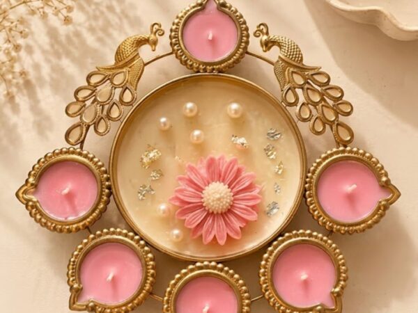 Gold peacock metal diya platter with tealights and center pearl flower dish